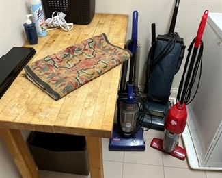 wood block table and nice vacuum cleaners