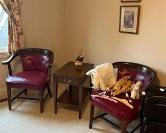 a pair of leather office or side chairs