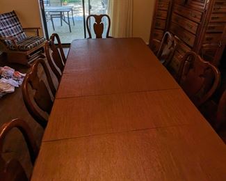 Dining room table and eight chairs $300