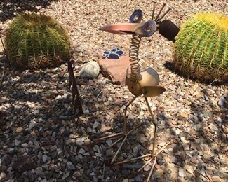 Outdoor metal tramp art pieces