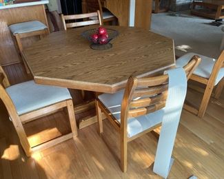 . . . an oak dining room table and chairs