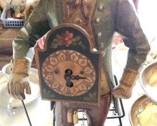 Cast iron top hat peddler clock