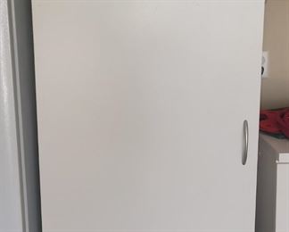 Tall storage cabinet