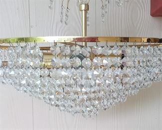 SMALL CHANDELIER.  MISSING A FEW PRISMS