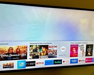 65" Samsung Crystal UHD 7 Series HDTV, Smart and WiFi with Stand, Remote Control and Manual.  Works great and excellent picture.