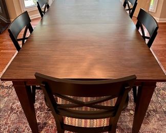 Ethan Allen Custom Fixed Top Dining Table with Avery Four-Way Tapered Leg with Dark Brown Finish and Satin Sheen.  72" L x 42" W x 30" Tall.  This configuration is  on Ethan Allen Web Site. In addition the two Blake Armchairs and 4 Blake Side Chairs are currently on Ethan Allen Website.