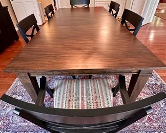 Ethan Allen Custom Fixed Top Dining Table with Avery Four-Way Tapered Leg with Dark Brown Finish and Satin Sheen.  72" L x 42" W x 30" Tall.  This configuration is  on Ethan Allen Web Site. In addition the two Blake Armchairs and 4 Blake Side Chairs are currently on Ethan Allen Website.