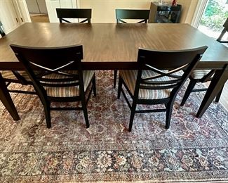 Ethan Allen Custom Fixed Top Dining Table with Avery Four-Way Tapered Leg with Dark Brown Finish and Satin Sheen.  72" L x 42" W x 30" Tall.  This configuration is  on Ethan Allen Web Site. In addition the two Blake Armchairs and 4 Blake Side Chairs are currently on Ethan Allen Website.