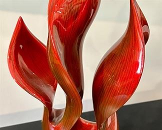 Striking Sculpture in Wood or Composite with Lacquer Red representing a Flame.