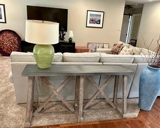 Ethan Allen Bruckner Metal-Top Console Table. 60.5" W x 18" D x 30"H.  Currently on Ethan Allen Web Site at $1970.00.  Crafted in Solid Rubberwood Frame and Zinc top with Brass Nail Heads for Industrial Look.