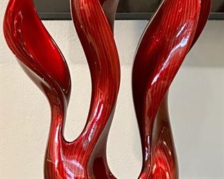 Striking Sculpture in Wood or Composite with Lacquer Red representing a Flame.