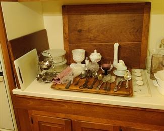 large antique cutting boards and antique kitchen deco, silver plate serving set