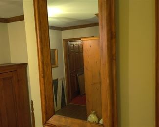 large wall mirror with wood frame