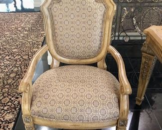 Set of eight upholstered dining chairs with same trim as table