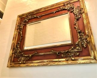 Neoclassical John-Richard mirror with vermillion red and gilt frame