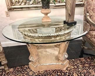Large glass top table with silver trim
