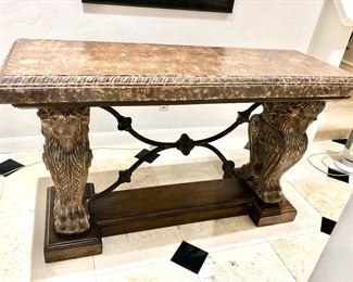 Impressive rams head base and distressed top console table