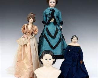 Four 19th to early 20th century dolls and a doll head. Includes a Greiner's paper mache doll head and doll on a jointed cloth body, a Bisque socket head doll on a jointed cloth body with porcelain lower arms, and a Bisque half doll on a wire base. Greiner's with partial original stickers. Some wear and damage overall, fabric with fading, wear and tears. Up to 17" high. ESTIMATE $100-150