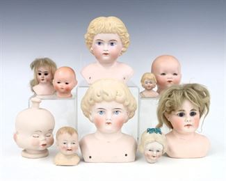 Ten 19th and 20th century Bisque porcelain doll heads. Various sizes and hair styles with painted detail by makers including Armand Marseille, Eichhorn & Sohne and Dana Huff. Several with impressed marks. Some wear to paint and surface, one with repainted base with flake. 2 1/4" to 6 1/4" high. ESTIMATE $100-200