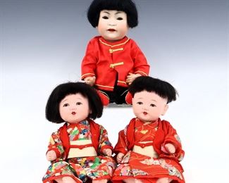 Three early to mid 20th century Asian character dolls. Includes one with Bisque socket head, sleep eyes and wig on a jointed composite body wearing traditional Chinese clothing, likely made by Kestner, and a pair with composite heads, stationary eyes and wigs on jointed composite bodies wearing traditional Japanese clothing. Chinese doll with faint impressed marks. Some wear to paint and composite, Chinese doll with touch-up to one hand, fabric with some wear. Up to 13" high. ESTIMATE $100-200