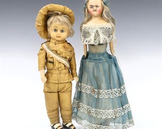 Two 19th century wax head dolls. Wax over paper mache and composite with inset glass eyes and Blonde wigs. Includes a girl with cloth body and kid arms wearing a Blue dress, and a boy with cloth body and composition lower limbs wearing a uniform. Some wear, cracking and minor losses to wax, fabric with wear and staining. Up to 14" high. ESTIMATE $50-100
