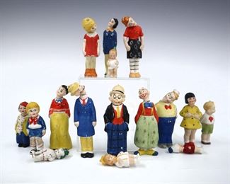 Sixteen early 20th century German bisque character figures. Includes twelve comic "nodders" from "Little Orphan Annie", "Harold Teen", "The Gumps" and others, and four miniature figures. Most with "Germany" marks and character names. Some wear and minor damage, loose stringing, one head glued on. Up to 4" high. ESTIMATE $50-100