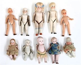 Ten miniature antique and vintage dolls by various makers. Bisque dolls with painted detail. Some wear and minor damage overall. Up to 4" long. ESTIMATE $100-150
