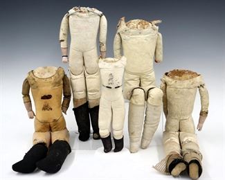 Five antique Kid doll bodies. Jointed and gusset-jointed bodies, three with Bisque lower arms. Three with faint printed marks or stickers. Wear and damage overall, as-is. Up to 20" long.