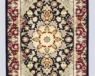 A 2.1 x 3.1' vintage Sino-Persian Wool and Silk rug. Multicolor floral design with central medallion on a Black field. Some wear and minor losses. ESTIMATE $100-200