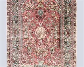 A 3' x 5' vintage Indo-Persian Silk prayer rug. Multicolor floral and bird design on a Pink field. Some wear, losses to edges. ESTIMATE $300-500