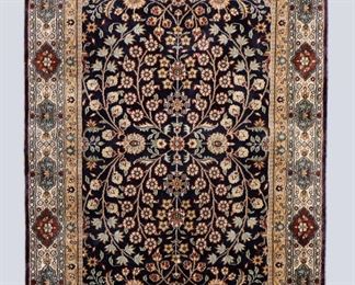A 2.6 x 4' vintage Indo-Persian Nain Silk and Wool rug. Multicolor floral design on a Navy Blue field. Some wear and losses. ESTIMATE $200-300