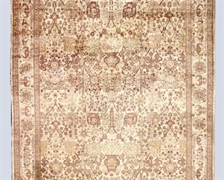 A 3.8 x 5.8' vintage Indo-Persian Silk rug. Multicolor floral design on an Ivory field. Some wear and staining, small areas of thinning. ESTIMATE $200-300