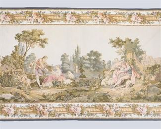 A mid 20th century French "Panneaux Gobelins" tapestry by JP, Paris. Decorative woven wall hanging depicting a farm scene with two courting couples. Original paper label verso. Minor wear and fading. 72 1/2 x 41" high overall. ESTIMATE $200-400
