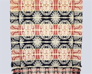 A mid 19th century Jacquard coverlet with corner blocks made by "D. (Dennis) Cosley" in "Xenia, Green Co." Ohio in "1849". One piece construction with floral medallion and Tulip sunburst design with floral basket border in Red, Blue and Tan. Some wear, edge damage, minor staining and a few small holes. Approx. 71 x 85" long overall. ESTIMATE $100-200