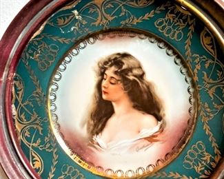 #12. $80. Pair of Round Gilt Plates, Royal Vienna, circa 1860, in wood frames, 9.5".