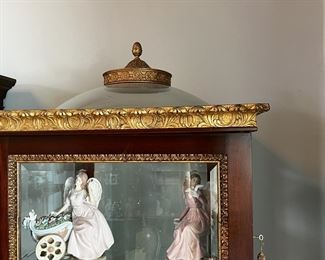 #30. $2,000. Pair of Curio Cases with gilt trim, 90"Hx32"x32".