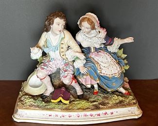 #36. $125. Chantilly Bisque Figurine of seated couple, 13"Wx6"Dx11"H.