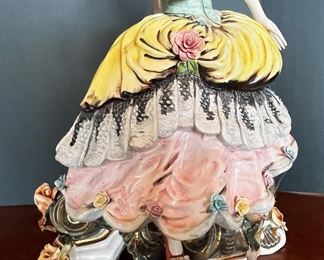 #40. $150. Capodimonte woman figure with candelabra 