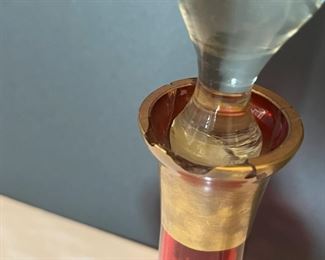 #17. $70. Lot of (4): German Porcelain Figure and Box, French Porcelain Children Figure & Gilt Ruby Decanter (chipped at rim).