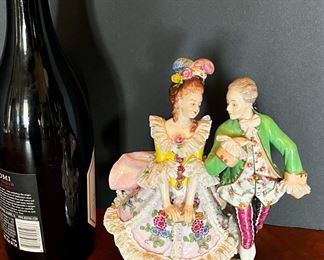 #59 - $70 German couple figurines - marked.