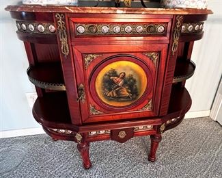#66 - $400 Demilune Side Server with open shelves w/gallery and porcelain plaques, faux marble top, 42"Wx13.5"Dx37.5"H.
