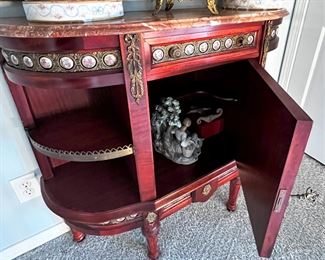 #66 - $400 Demilune Side Server with open shelves w/gallery and porcelain plaques, faux marble top, 42"Wx13.5"Dx37.5"H.