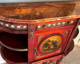 #66 - $400 Demilune Side Server with open shelves w/gallery and porcelain plaques, faux marble top, 42"Wx13.5"Dx37.5"H.