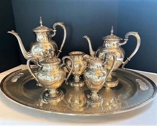 #89- $4,500  Sterling Silver Five Piece Tea Set and Tray. Tray alone is 10 pounds or 4535 grams, 5 Tea Set is approx. 113 oz. Marked Treasure.