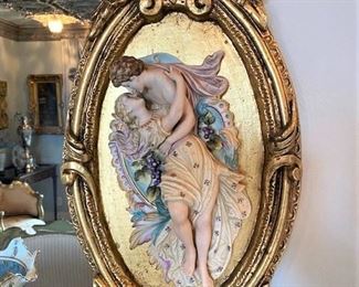 #102- $275 Rococo Gilded Mirror, with molded figures on each side.76x48 