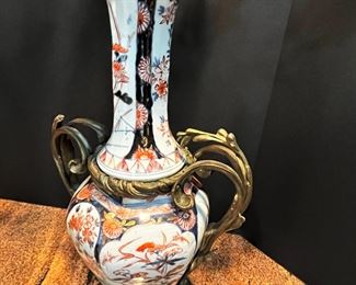 #106- $275 Chinese Porcelain Baluster Vase with bronze mounts and floral candle cups (one needs repair/welding). Priced as is.