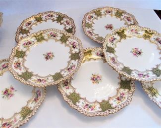 Lot 114 - $120 dessert set made of French figural cake stand & 8 Staffordshire plates gold rim, green, floral