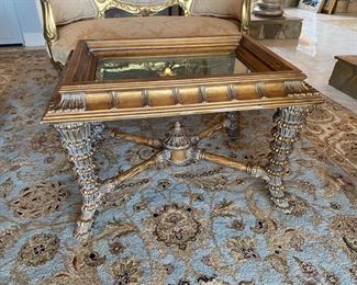 #124- $225- Coffee with glass top with wood dore