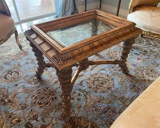 #124- $225- Coffee with glass top with wood dore