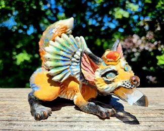 "Wing Kit" by RHONDA GHEEN Clay Sculpture Originals #43
22k Gold Luster Glaze, eyes of Glison Opal Triplets, Sunstone crown holding an Arkansas Quartz Crystal in its mouth